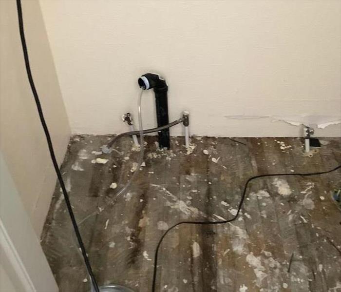 Water damage in a bathroom in Flagstaff, AZ, that was caused by the plumbing in the bathroom during a remodel